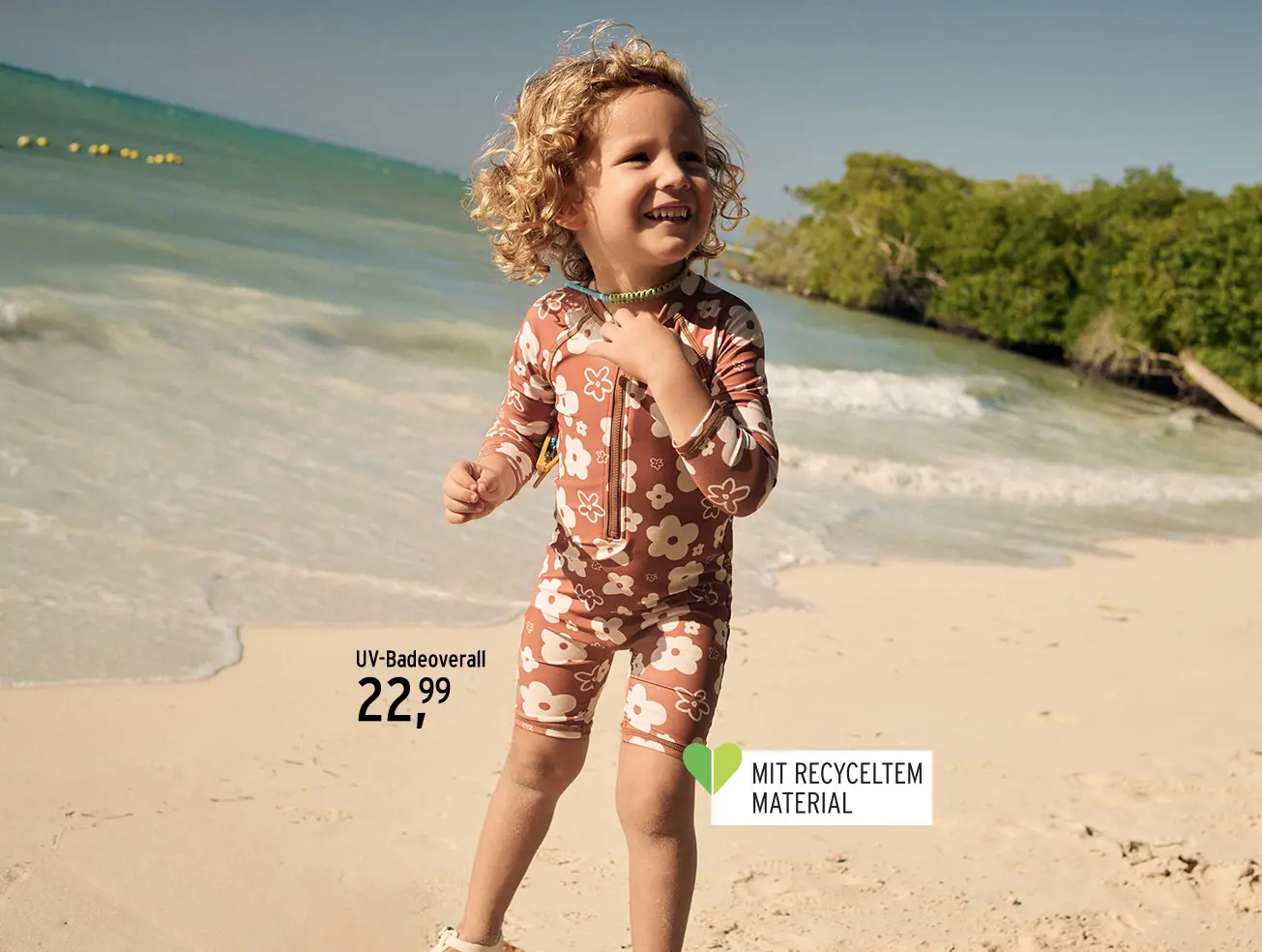 UV-Overall mit floralem Muster für Kinder