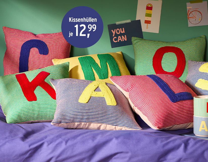 Kissen mit Buchstabenmotiven